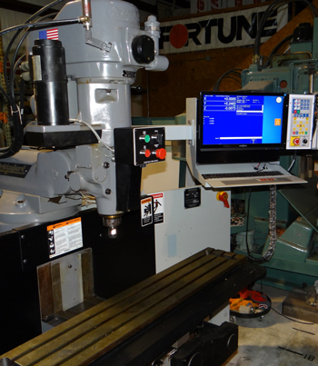 DX-32 upgraded CNC operators console and Z axis servo motor